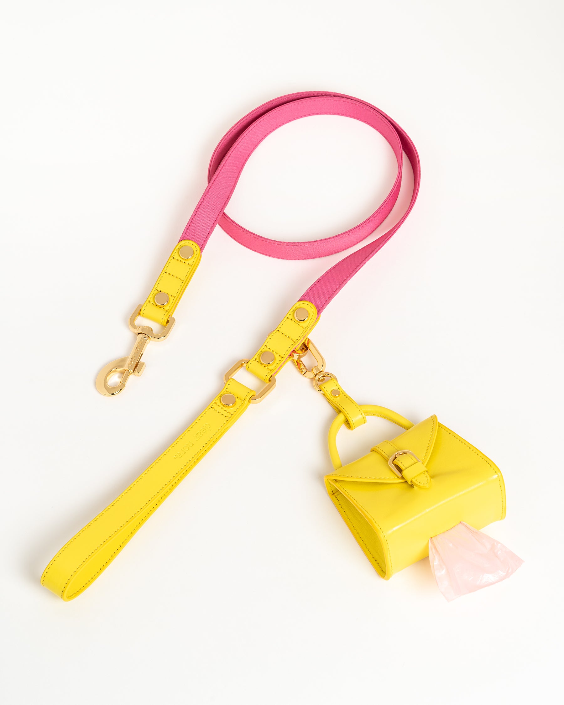 Dear Nora Bubblegum dog leash and poop bag holder - yellow leather, pink fabric and 24k plated hardware - top down shot