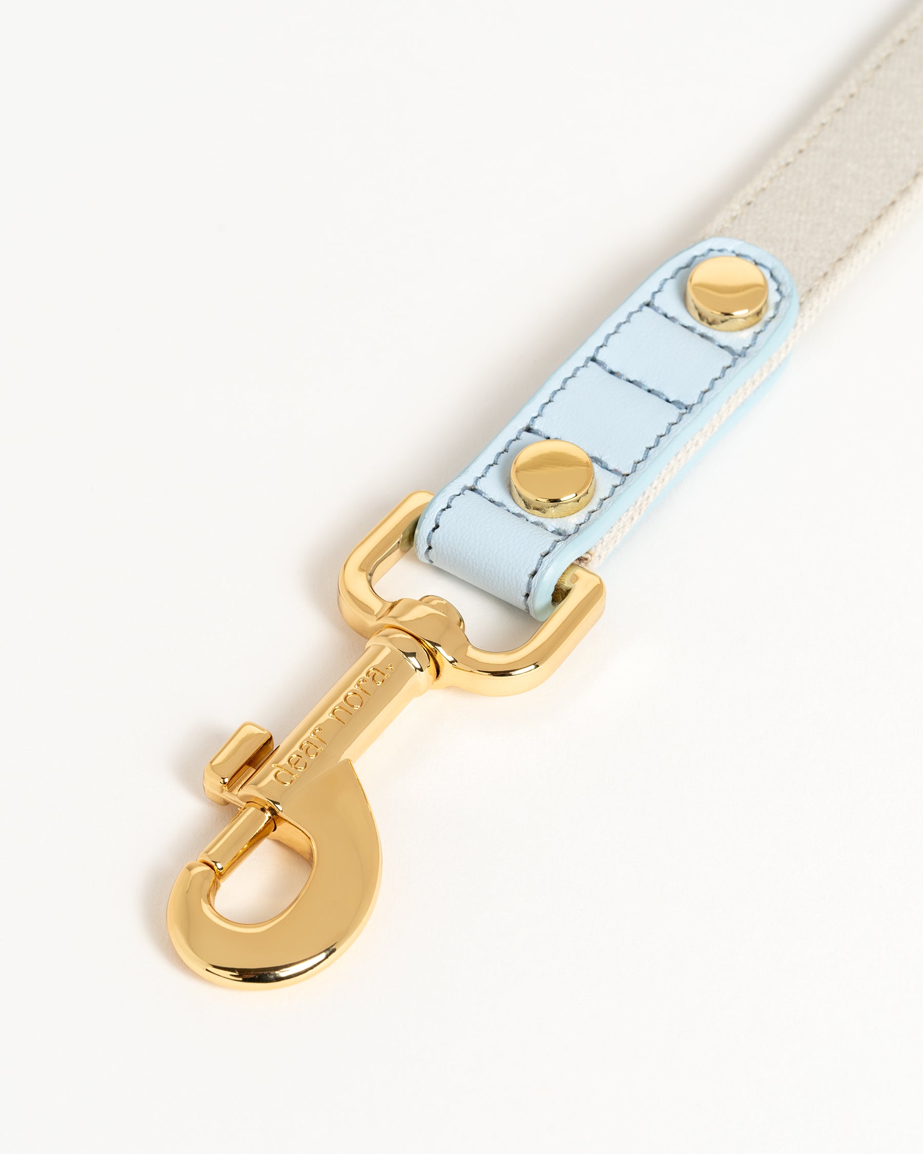 Dear Nora Sapphire dog leash hook - baby blue leather, cream sparkle fabric and 24k plated hardware - close up shot
