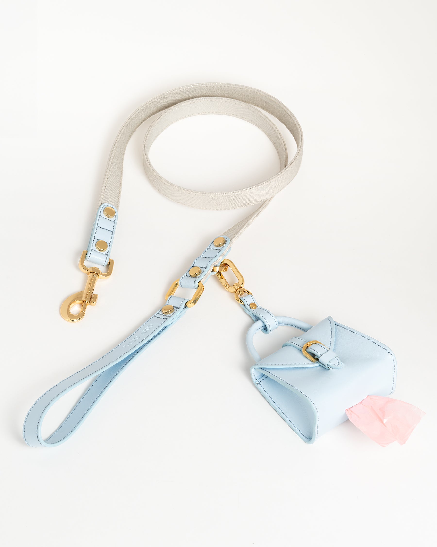 Dear Nora Sapphire dog leash and poop bag holder - baby blue leather, cream sparkle fabric and 24k plated hardware - top down shot